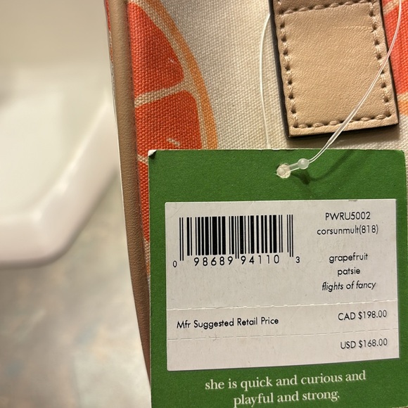 Kate Spade 11” clutch NWT. The only flaw is a small water mark under plastic. - Picture 16 of 16